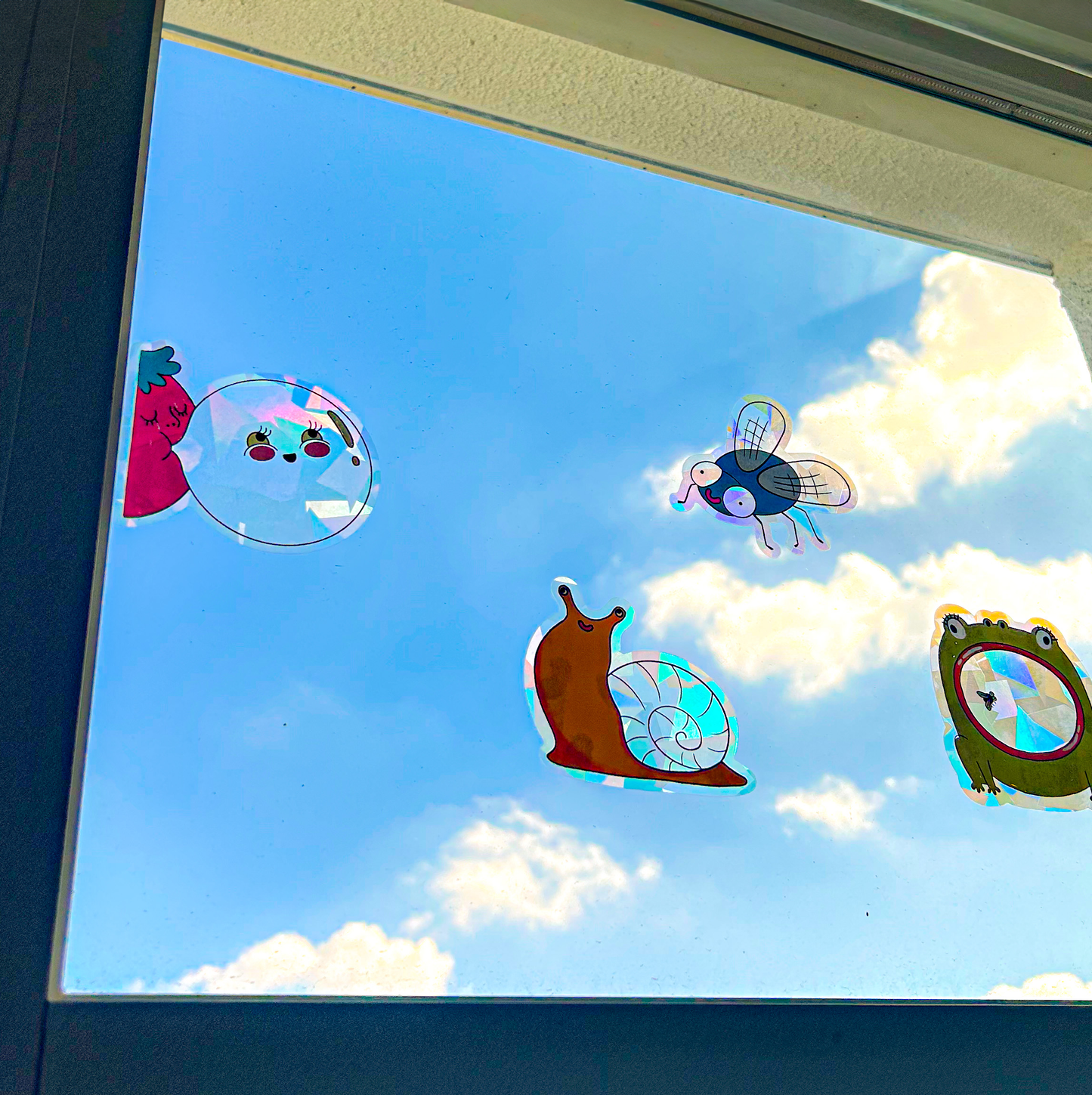 Cute Bubble Gum Suncatcher displayed in cozy, sunlit room