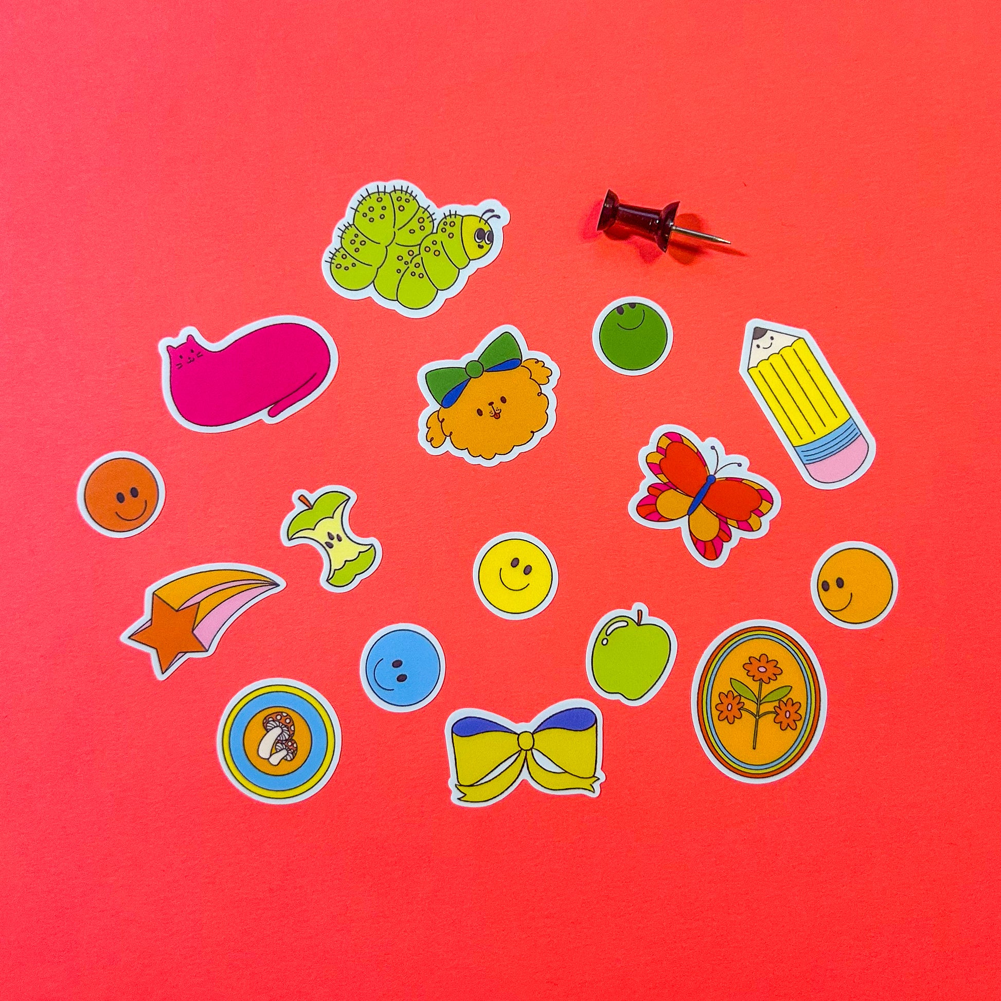 Mini sticker sheet with colorful and playful designs for decorating water bottles and laptops"